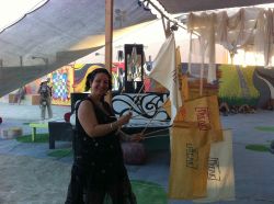 Giving away freak flags at Center Camp-Burning Man 2011