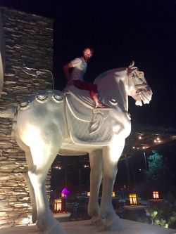 Ryan climbs the horse at PF Chang's